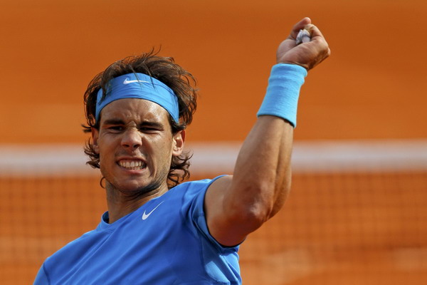 Nadal comes back to beat Isner at French Open