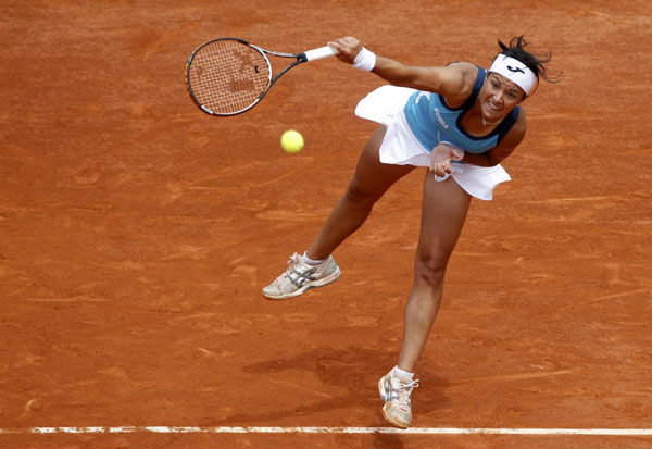 Li Na through 2nd round at French Open