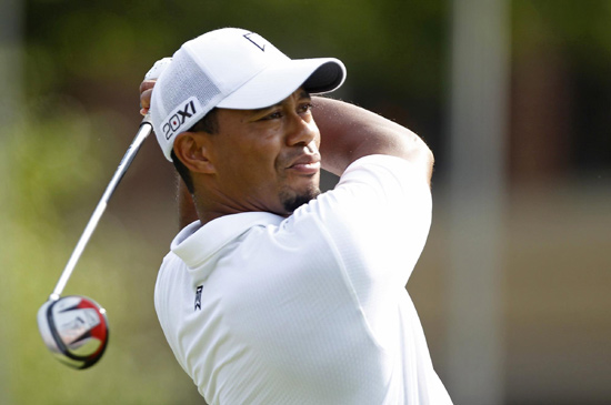 Woods comeback hits uneven ground on day two