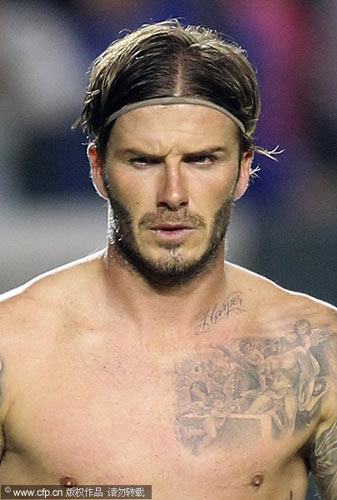 Beckham reveals new tattoo of daughter's nam