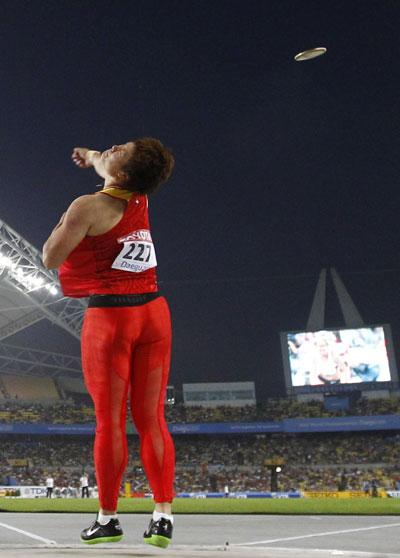 Li Yanfeng wins China's first world title in discus throw