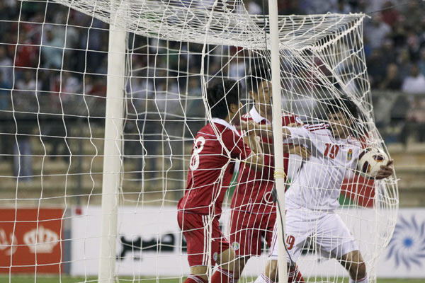 In photos: China suffers 1st loss to Jordan in 27 years