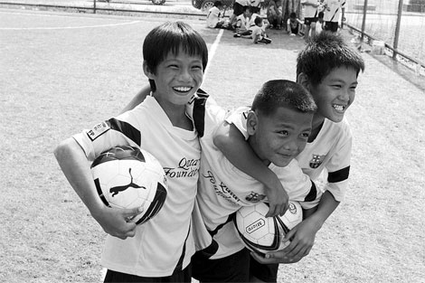 Friendly ties at the border begin with a game of soccer