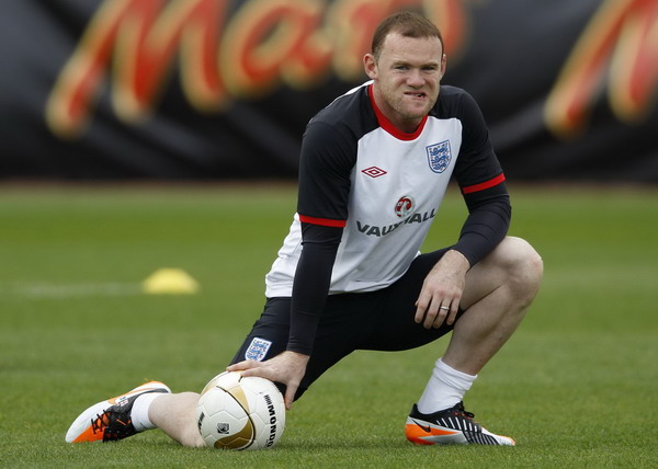 England striker Rooney gets three-match ban