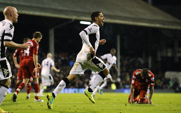 Late Dempsey goal gives Fulham win over 10-man Liverpool