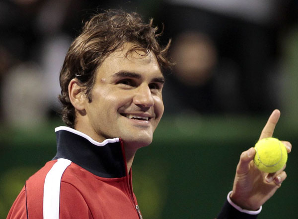 Rampant Federer crushes Davydenko in Doha