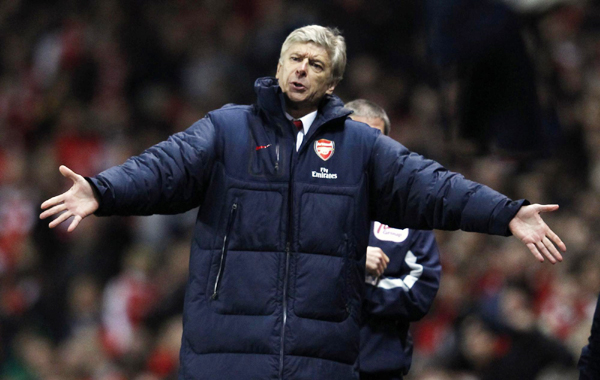'Wake up and focus', says Wenger