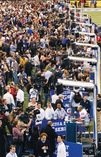 Fans pay for front-row view of bunch of people working