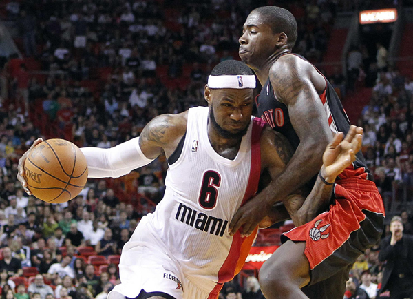 LeBron rescues Heat from near collapse to Raptors