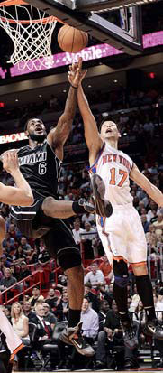 Heat contain Lin, roll to 8th straight victory