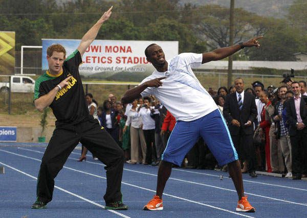 Prince Harry runs with Usain Bolt in Jamaica