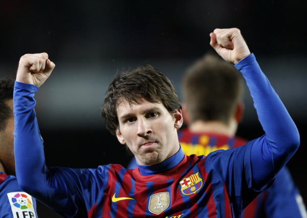 Messi puts Barca within five points of Real