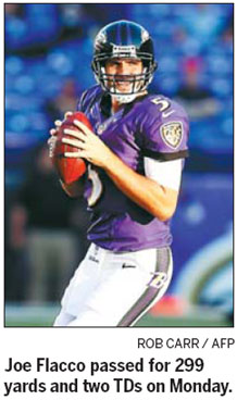 Flacco carries Ravens past Bengals