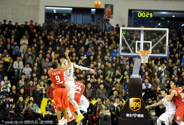 T-mac's 1.7-sec shot nails Qingdao's 3rd straight win