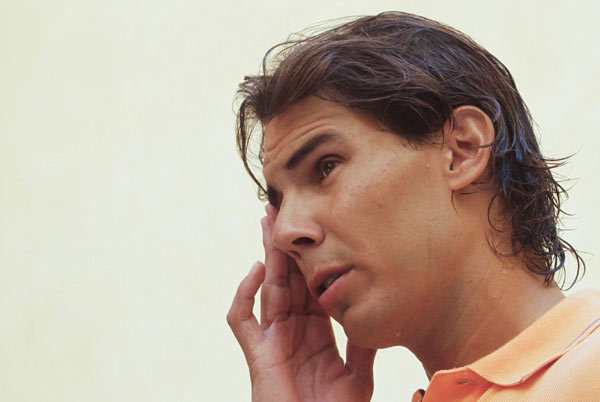 Nadal recovery on course, confirms return next month