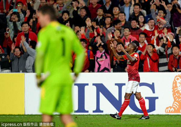 Evergrande on top after tough fight with Mariners