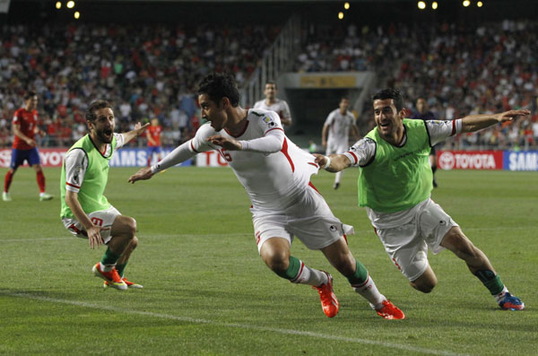 Iran 'in heaven' as soccer team qualifies for 2014 World Cup