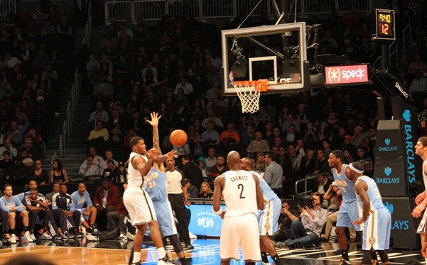 Nets knocked down by Nuggets, home boos