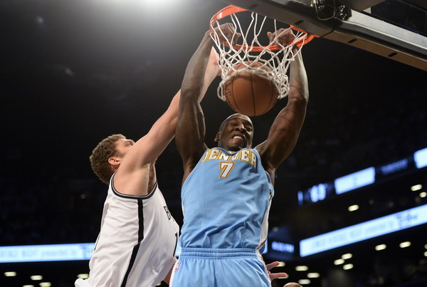 Nets knocked down by Nuggets, home boos