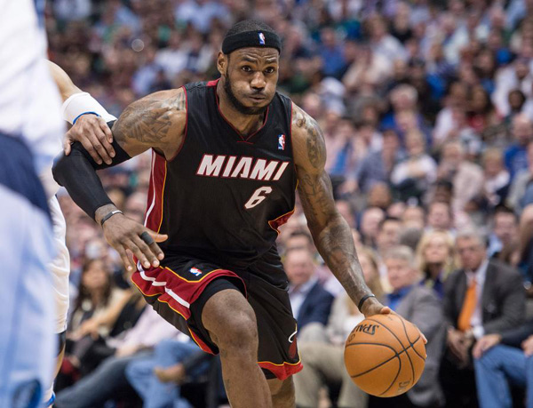 James scores 42, Heat pull away from Mavs 117-106