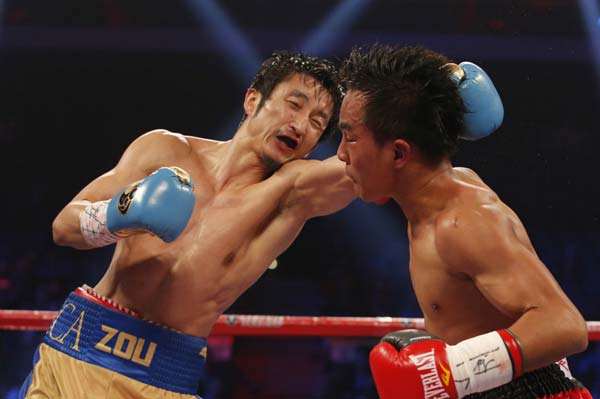 Zou's KO victory boosts shot at world title in Nov