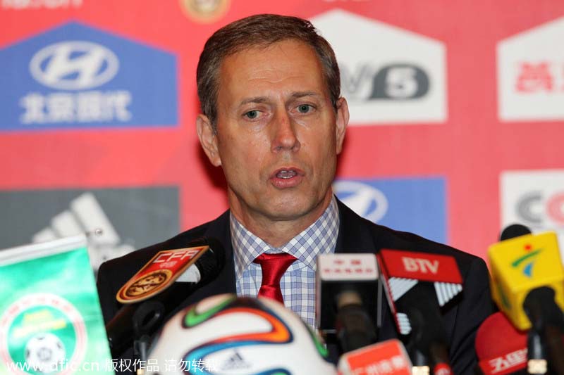 In photos: Frenchman Perrin named coach of Chinese soccer team