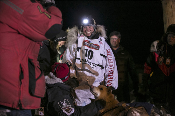 Son unseats father to win Alaska's dog sled race