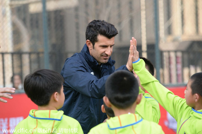 Luis Figo launches football academy in Beijing