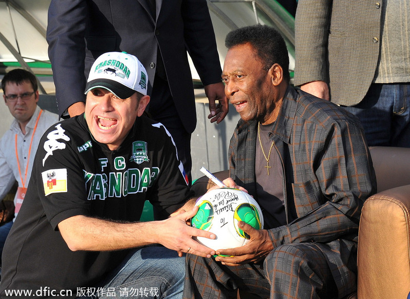 Pele treated with football cake