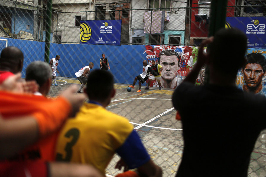 Soccer match in Rio de Janeiro's slum