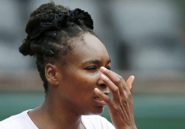'13 French champ Serena Williams loses; Venus, too
