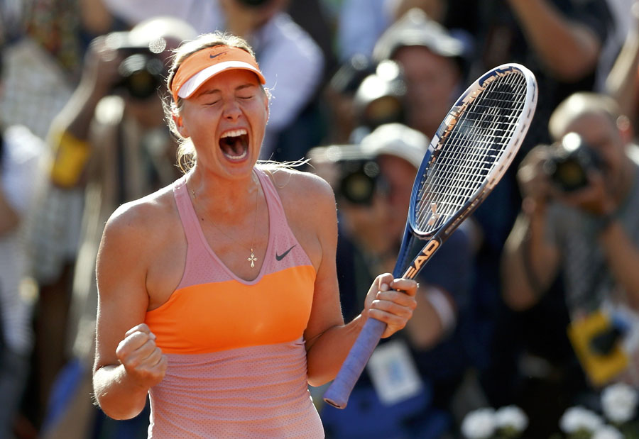 Sharapova floors Halep to win second French Open title