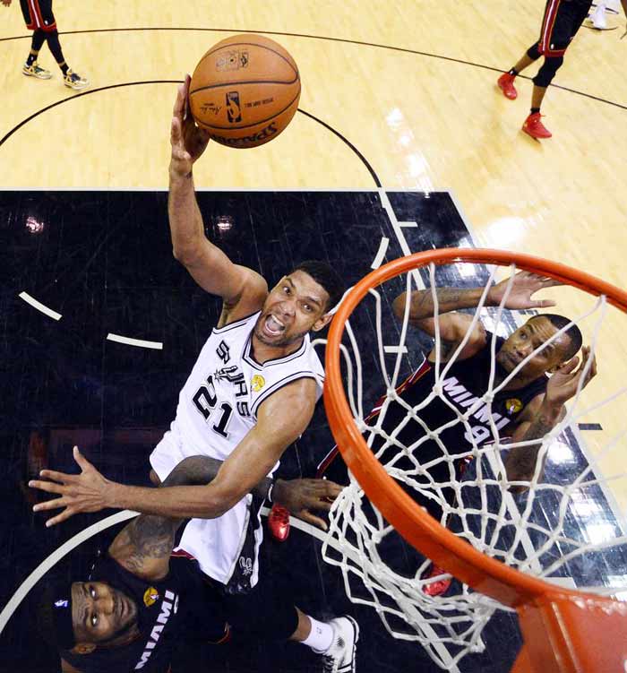 James carries Heat past Spurs to tie NBA Finals