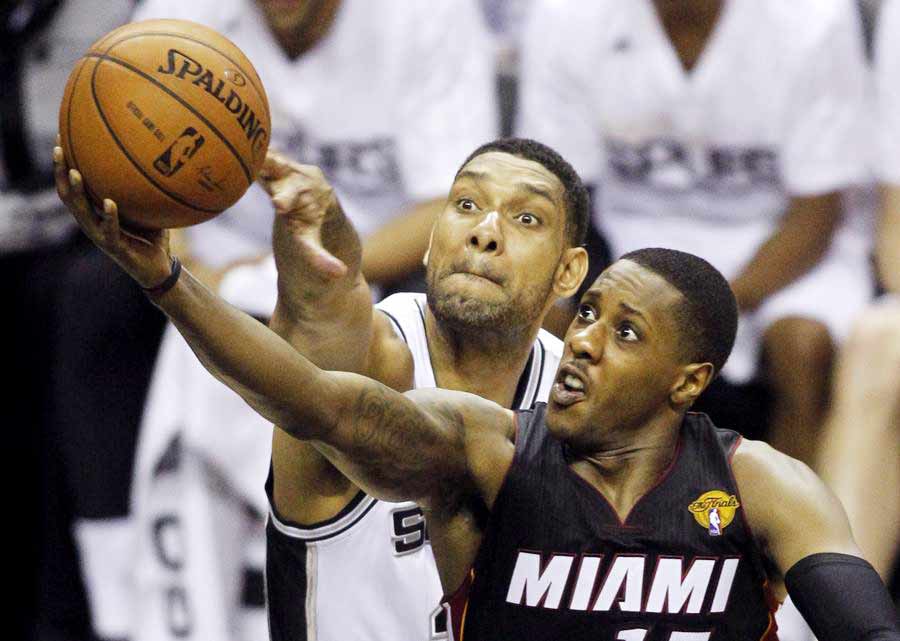 James carries Heat past Spurs to tie NBA Finals