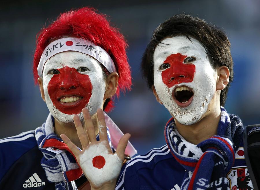 National flags on fan's face
