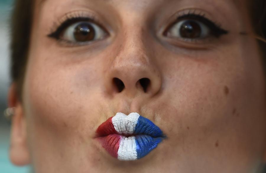 National flags on fan's face