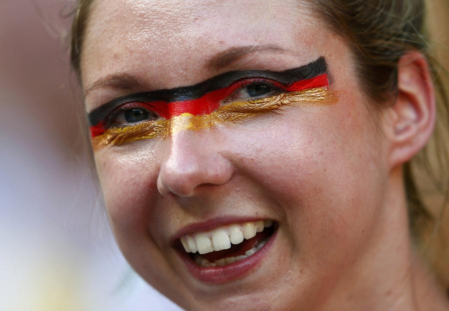 National flags on fan's face