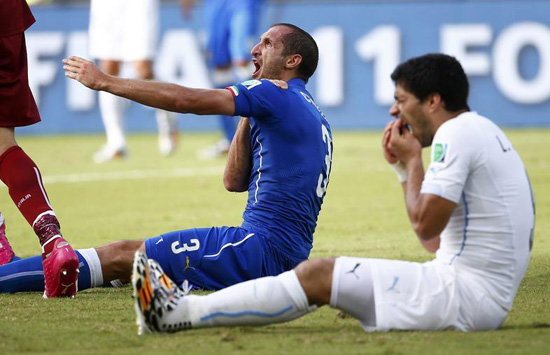 FIFA probe Suarez bite furore, lengthy ban seen