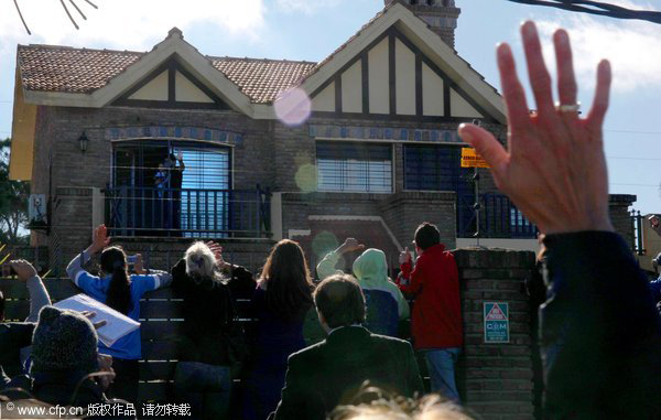 Luis Suarez receives a hero's welcome at home