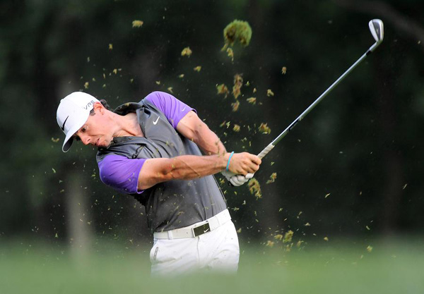 McIlroy wins PGA in thrilling show on soggy turf