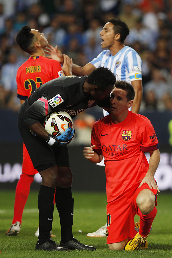 Misfiring Barca drop first points away to Malaga