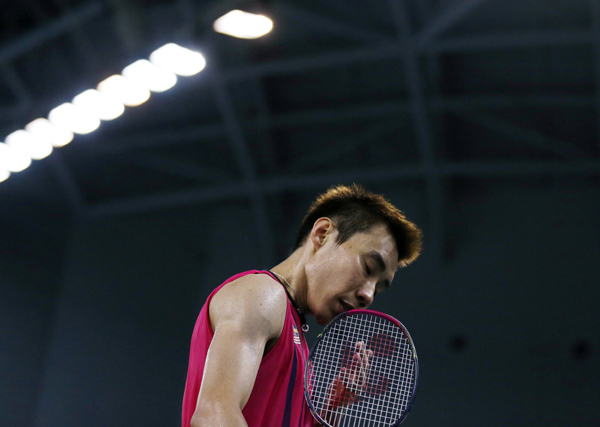 Badminton-World No 1 Lee denies cheating, hopes to clear name