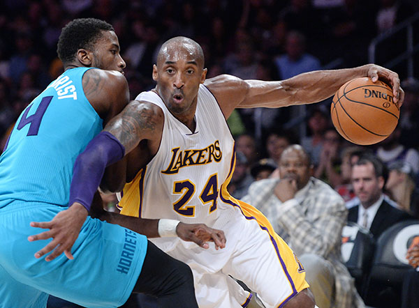 Lakers beat Hornets 107-92 for 1st win of season