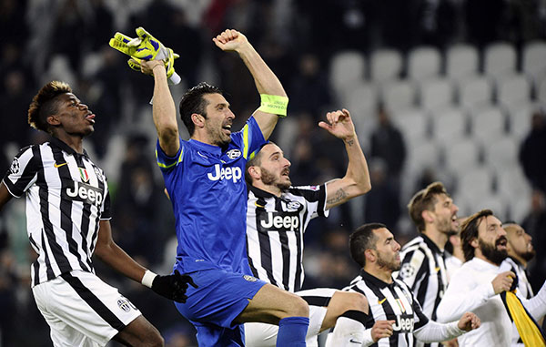 Juventus scrape through with risk-free draw