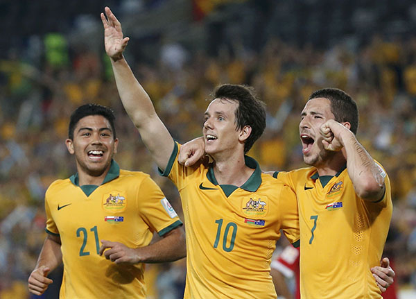 Australia sweep into quarter-finals with 4-0 win over Oman