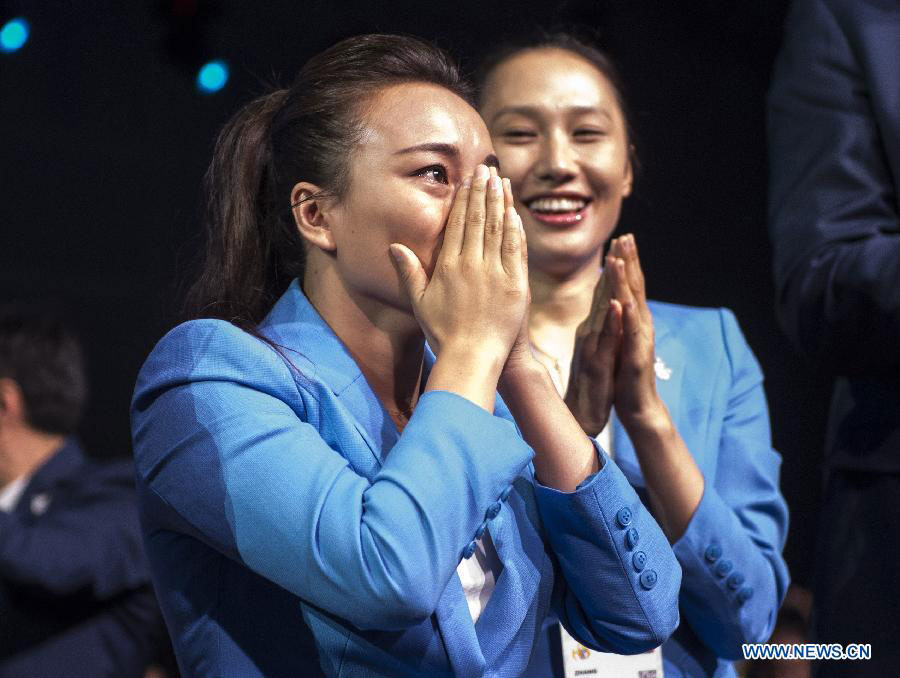 Chinese celebrate Beijing's win