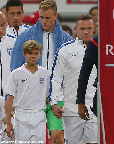 Romeo Beckham serves as mascot in Euro qualifier