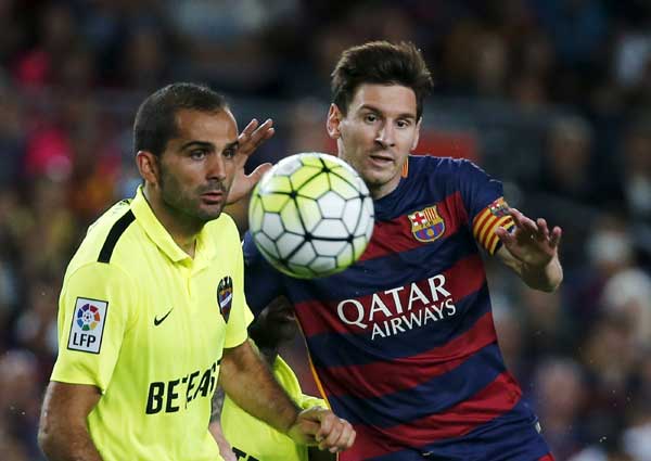 Messi at the double as Barca defeat Levante to remain top in Spain