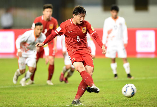 China crushes Bhutan to keep perilous World Cup qualification alive