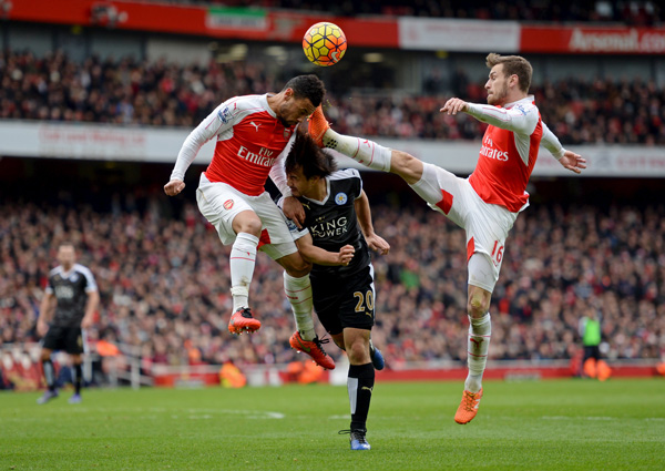 Arsenal, Spurs win crucial games with late goals